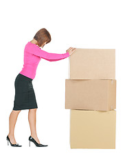 Image showing attractive businesswoman with big boxes