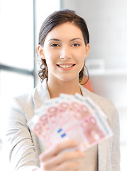 Image showing lovely woman with euro cash money