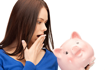 Image showing lovely woman with piggy bank