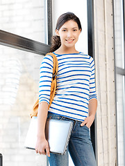 Image showing happy and smiling teenage girl with laptop