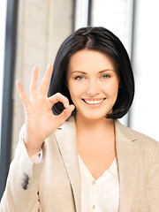 Image showing young woman showing ok sign