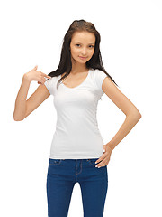 Image showing smiling teenage girl in blank white t-shirt