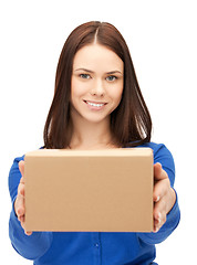 Image showing attractive businesswoman with cardboard box