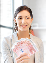 Image showing lovely woman with euro cash money