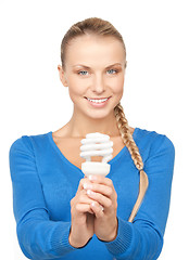 Image showing woman holding energy saving bulb