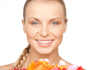 Image showing lovely woman with red flowers