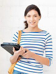 Image showing happy teenage girl with tablet pc computer