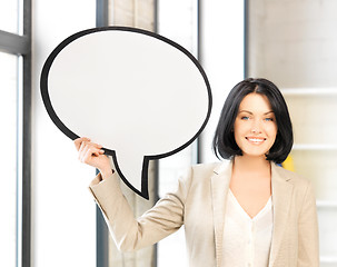 Image showing smiling businesswoman with blank text bubble