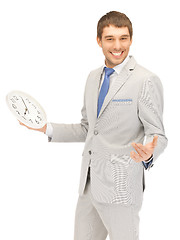 Image showing man with clock