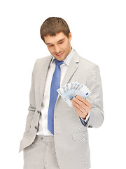 Image showing handsome man with euro cash money