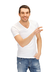 Image showing man in white shirt pointing his finger