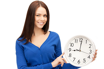 Image showing woman holding big clock