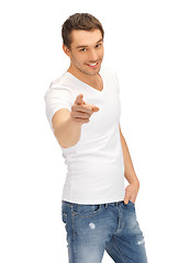 Image showing man in white shirt pointing his finger