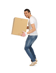 Image showing handsome man with big box