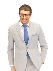 Image showing happy businessman in spectacles