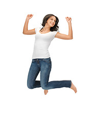 Image showing jumping woman in blank white t-shirt