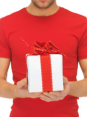 Image showing man's hands holding gift box