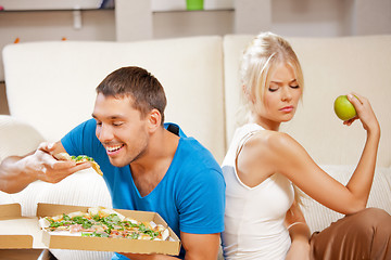 Image showing couple eating different food