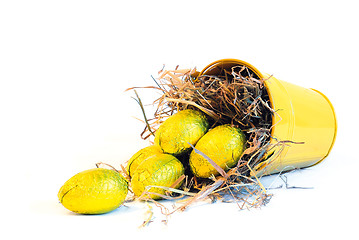 Image showing yellow bucket with yellow easter eggs