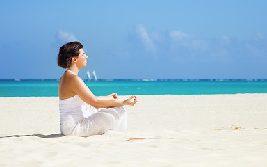 Image showing meditation on the beach