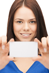 Image showing attractive businesswoman with business card