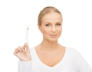 Image showing female doctor with thermometer