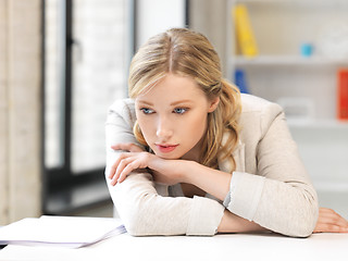 Image showing unhappy woman in office