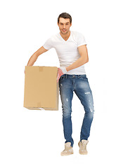 Image showing handsome man with big box