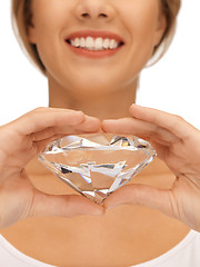 Image showing smiling woman with big diamond