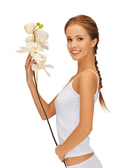 Image showing lovely woman with orchid flower