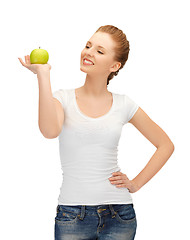 Image showing teenage girl with green apple