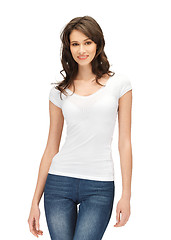 Image showing smiling teenage girl in blank white t-shirt