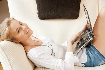 Image showing happy teenage girl with laptop computer