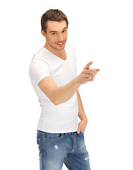 Image showing man in white shirt pointing his finger