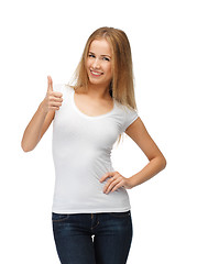Image showing teenage girl in blank white t-shirt with thumbs up