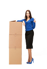 Image showing businesswoman with big boxes