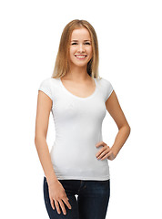 Image showing smiling teenage girl in blank white t-shirt