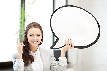 Image showing smiling businesswoman with blank text bubble