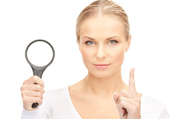 Image showing woman with magnifying glass