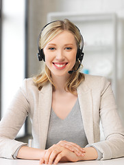 Image showing friendly female helpline operator