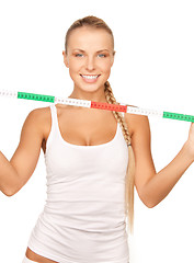 Image showing young beautiful woman with measure tape