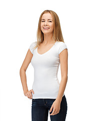 Image showing smiling teenage girl in blank white t-shirt