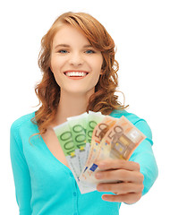 Image showing happy teenage girl with euro cash money