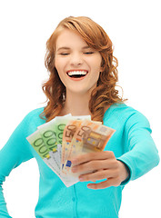 Image showing happy teenage girl with euro cash money