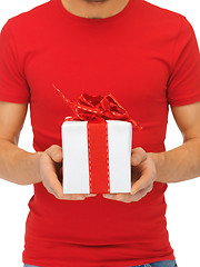 Image showing man's hands holding gift box