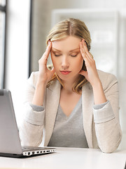 Image showing tired woman with laptop computer