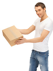 Image showing handsome man with big box