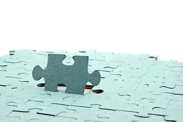 Image showing Jigsaw Fading into white background