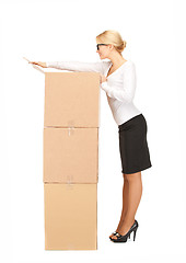 Image showing businesswoman with big boxes