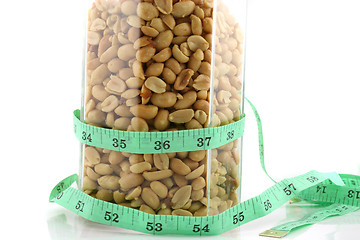 Image showing Peanuts in a Jar with Tape Measure 2